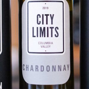 Three bottles of City Limits wine from the Pacific Northwest placed side by side.